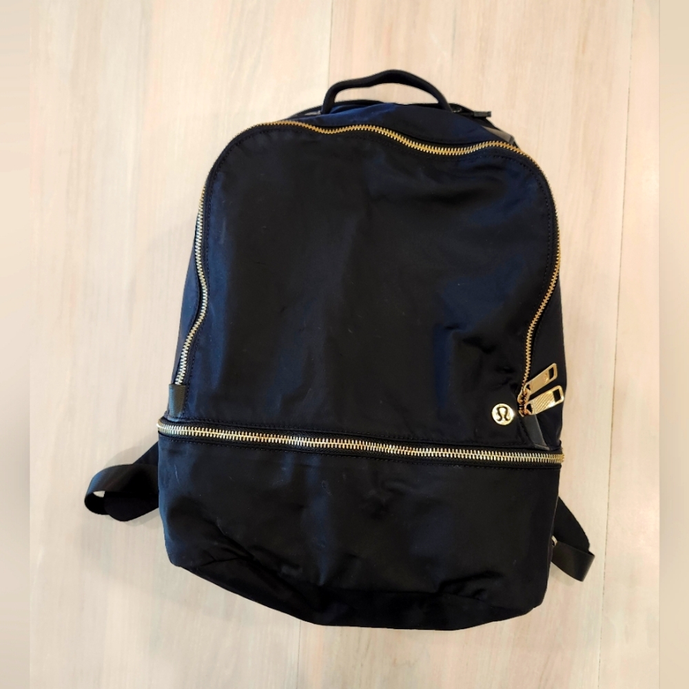 Black and Gold Lululemon Adventure Backpack 21 L